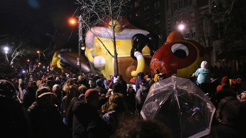 Thanksgiving balloons go up in rainy New York City