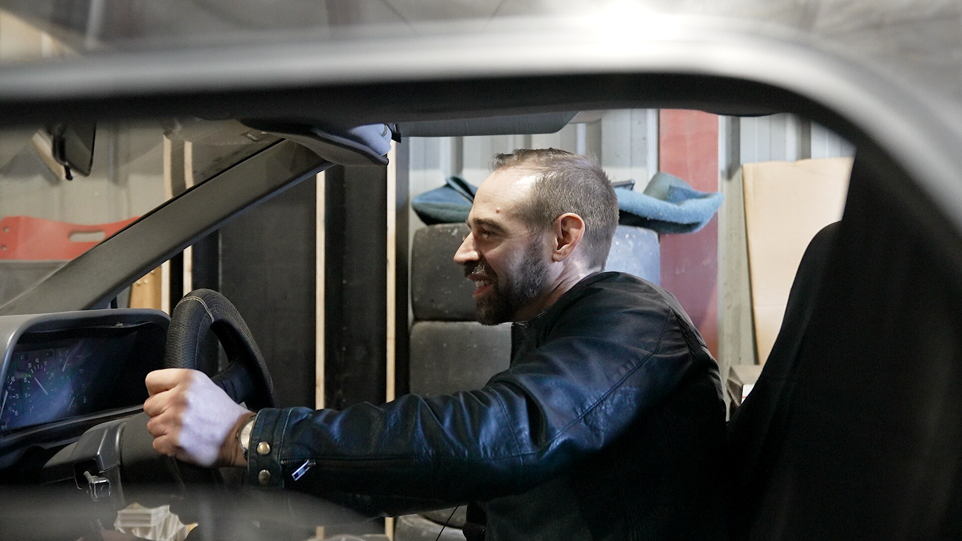 Che Baker inside his DeLorean