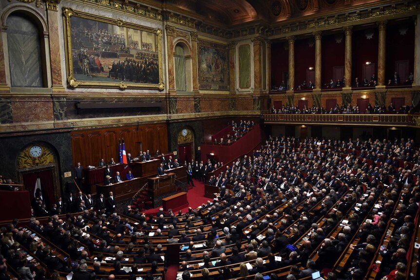 French President Francois Hollande delivers a speech to members of Parliament.
