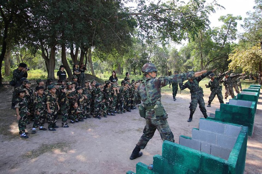 Children taught to salute