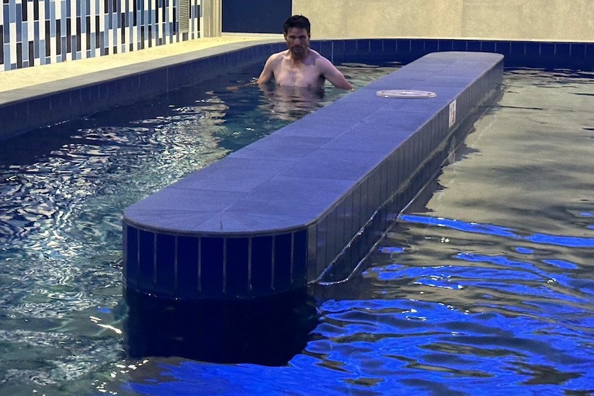 Shane Rose rehabs in a pool.