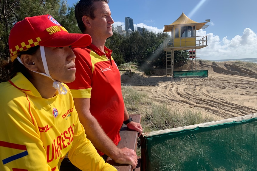 Two surf lifesavers watching water