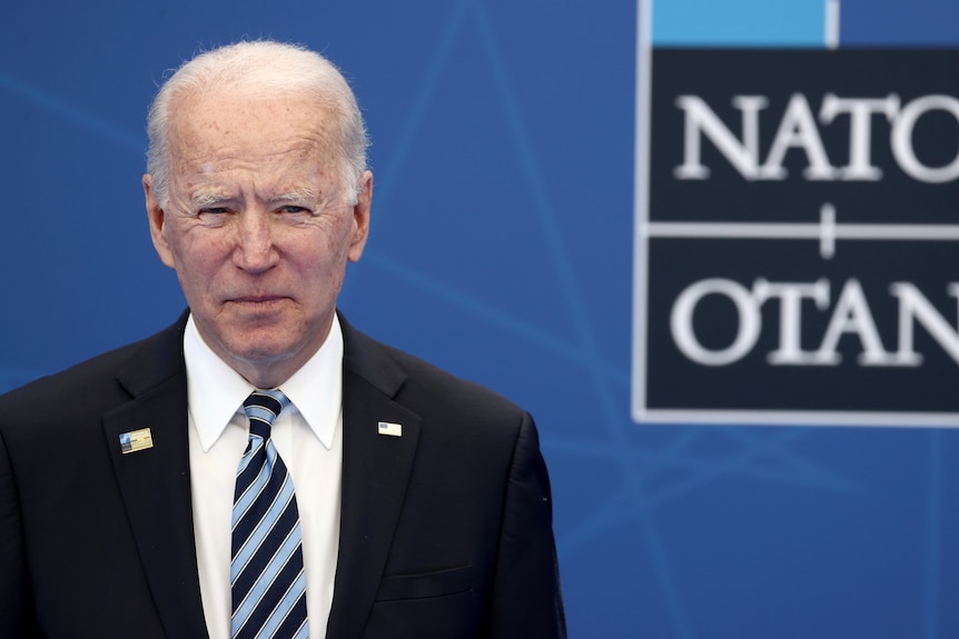 headshot of US President Joe Biden arriving for a NATO summit at NATO headquarters in Brussels,