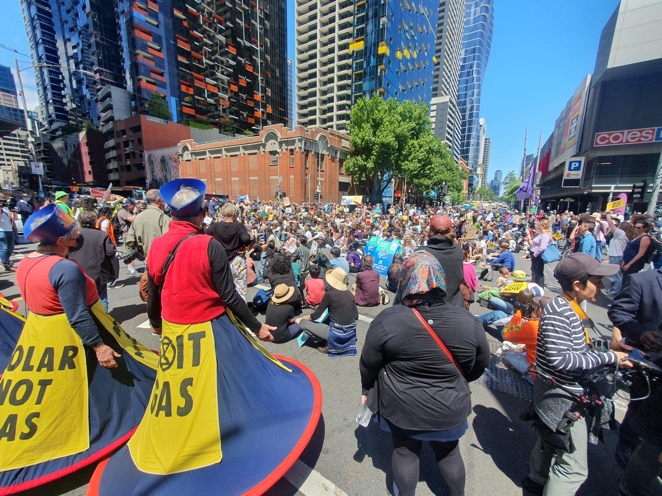 A crowd of hundreds of people gathered in the streets of Melbourne.