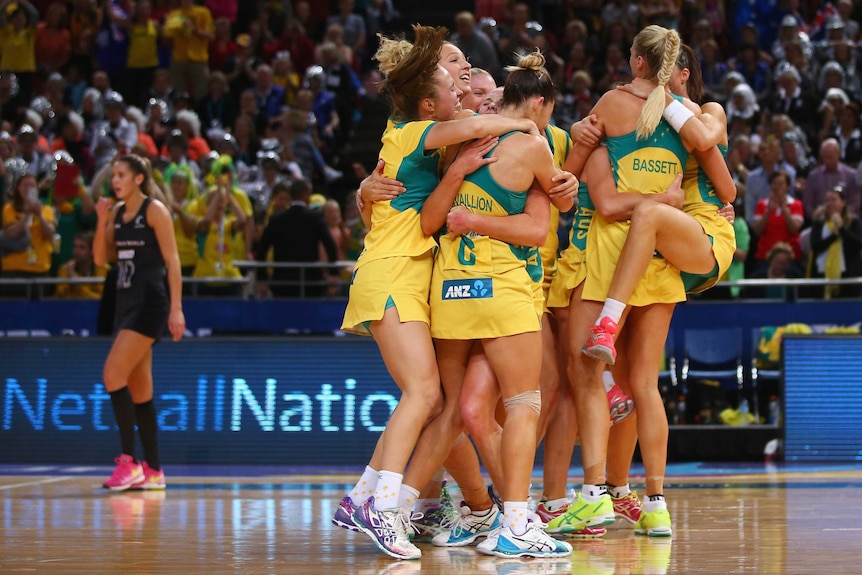 Australian Diamonds celebrate 2015 netball World Cup final win over New Zealand on August 16, 2015.