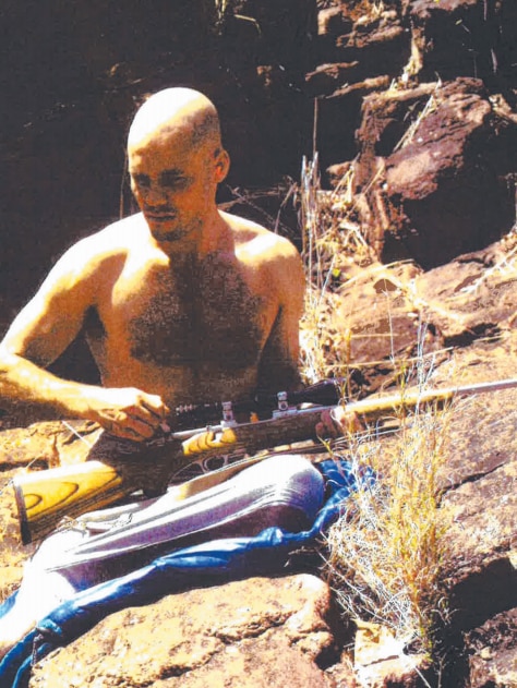 Convicted murderer Matej Vanko with a rifle.