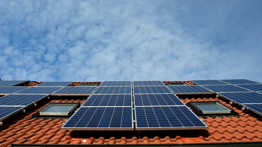 the roof of a house with solar panels