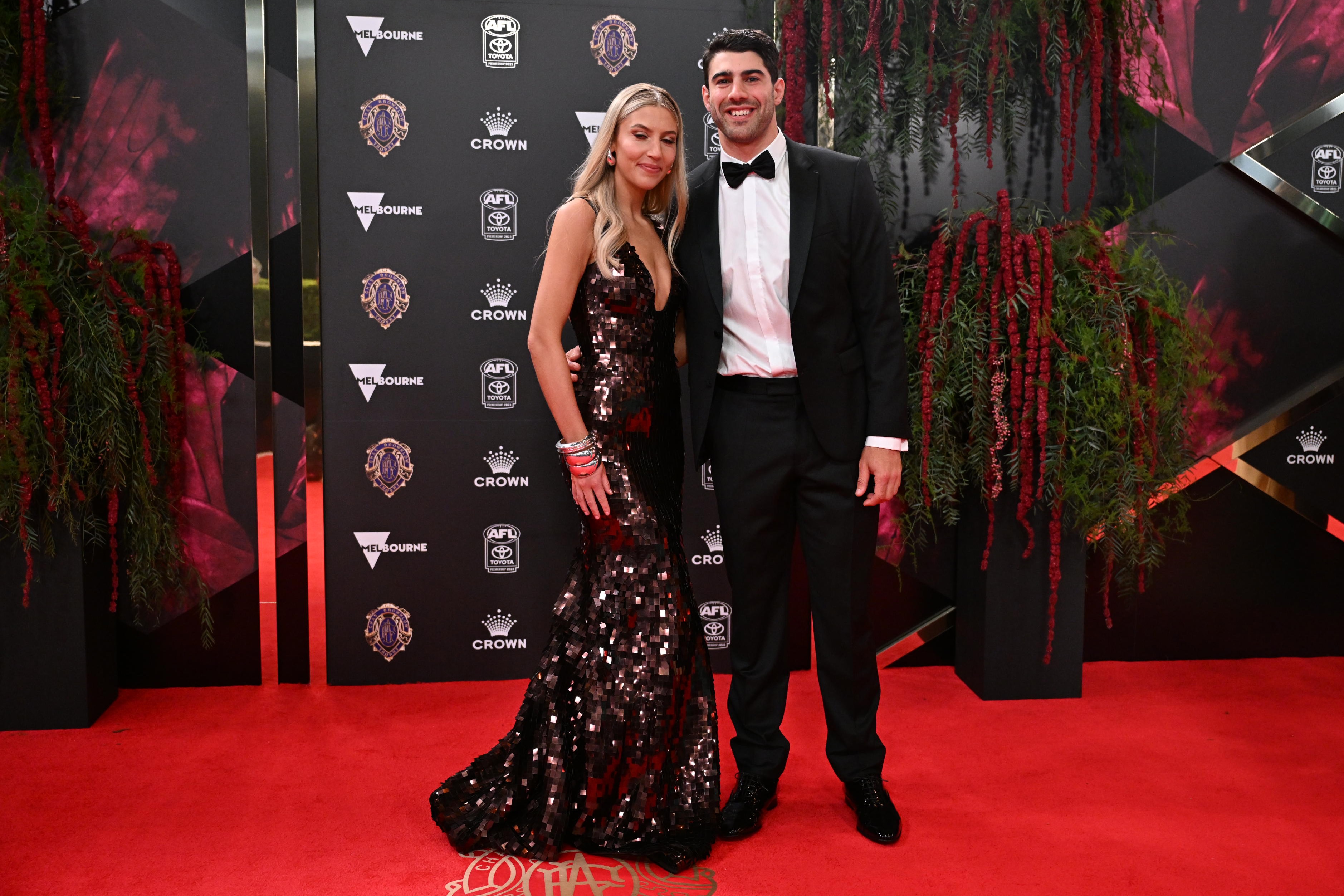 Brownlow hopeful Christian Petracca with partner Bella Beischer.