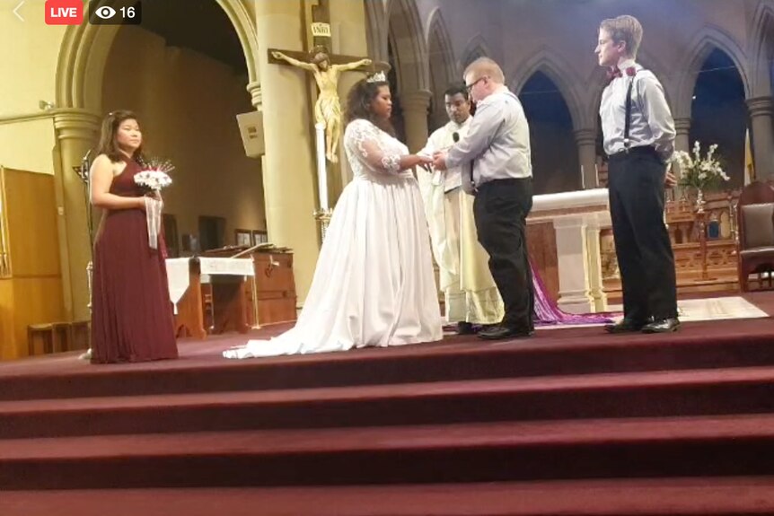 Devina and Chris exchaning vows