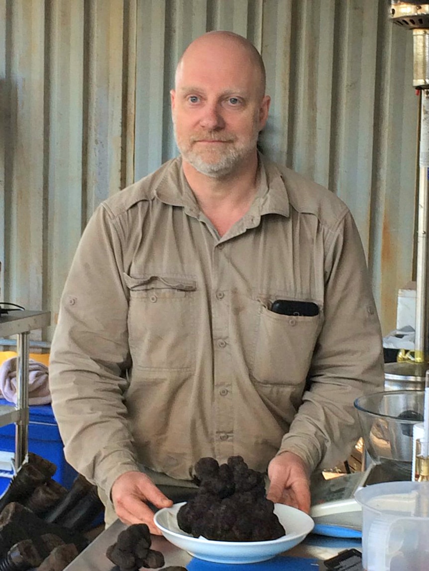 Yarra Valley farmer Stuart Dunbar with a giant truffle