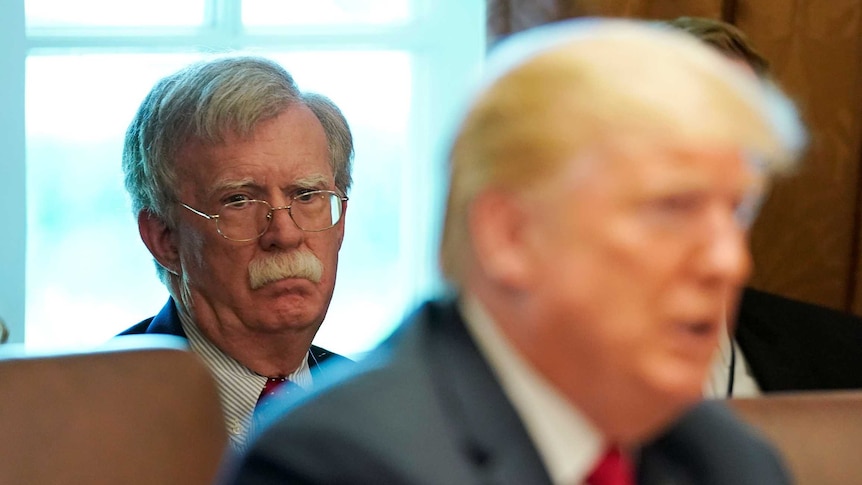 White House national Security Advisor John Bolton listens as US President Donald Trump holds a cabinet meeting
