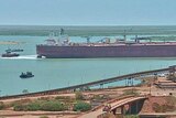 Tanker and tugs at Port Hedland