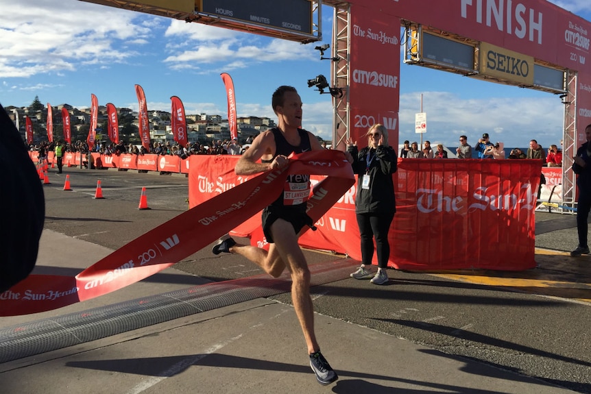 A man crossing a finishing line