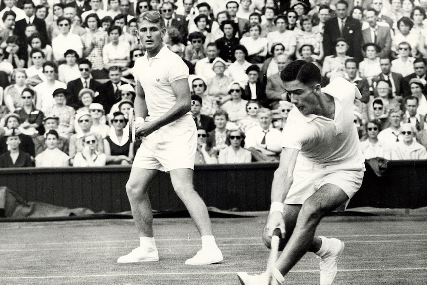 Australian tennis players Lew Hoad (left) and Ken Rosewall (right) playing a doubles match at the Wimbledon Championships.