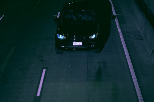 a black car on the road