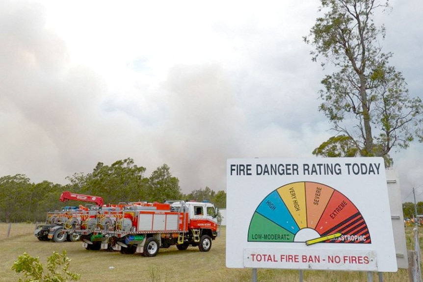 Fire engine and a fire danger rating sign.