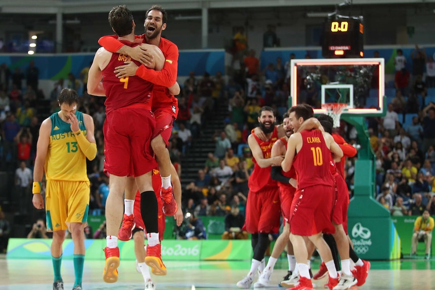 Spanish players celebrate bronze medal basketball win over Australia