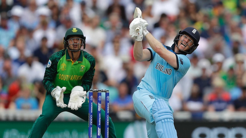Eoin Morgan looks up while on one knee as he plays a shot