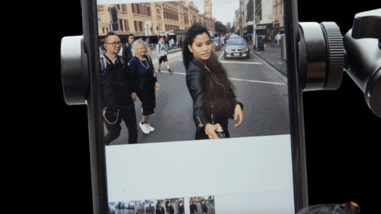 Sonam's screen featuring a selfie of her crossing Flinders Street.