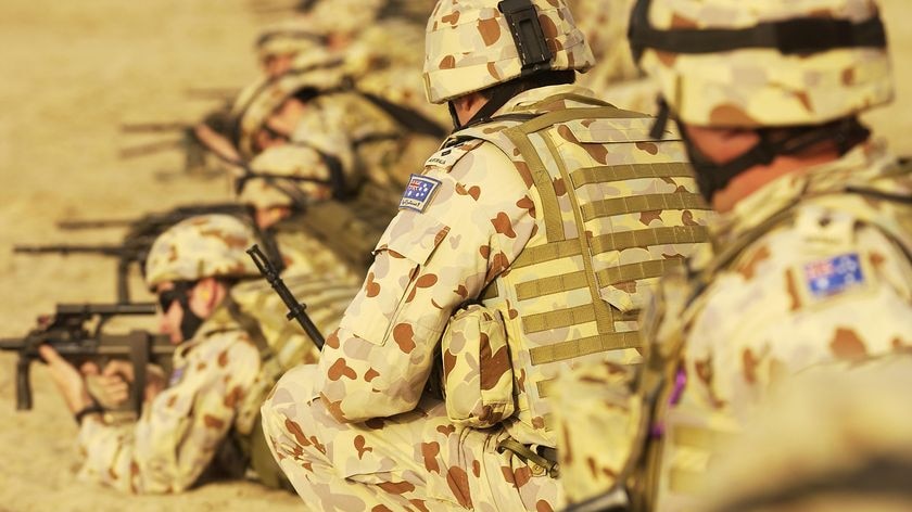 Soldiers from the Australian Army Training Team at the firing line (ADF)