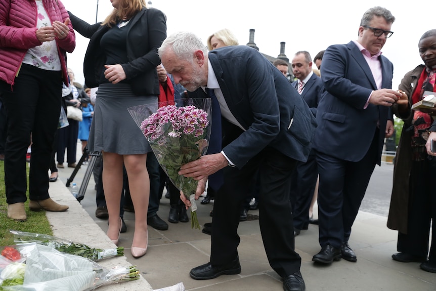 Jeremy Corbyn lays a wreath