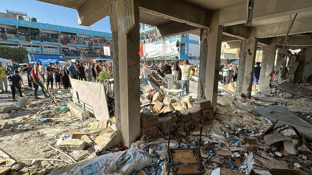 Over a dozen killed in Israeli strike on Gaza shelter - ABC listen