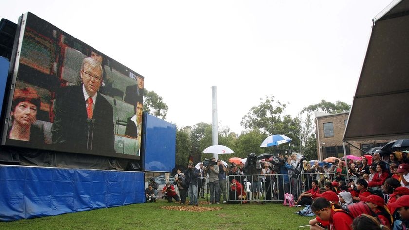 Sydneysiders gather to watch the live television broadcast from the Parliament House