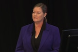Former director at the Department of Human Services Tenille Collins wearing blue jacket at the Robodebt royal commission