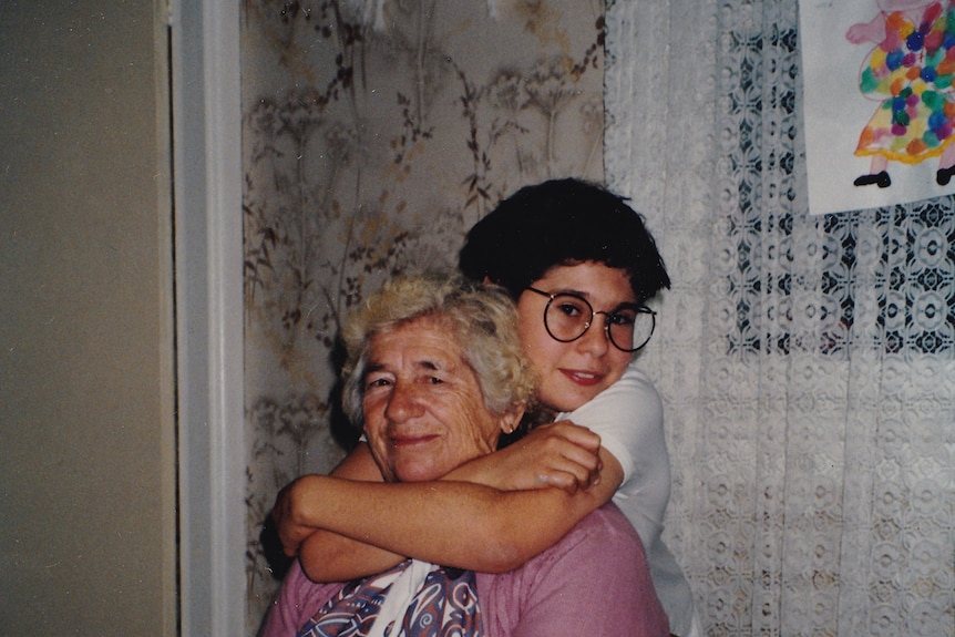 Faded colour photograph of artist David Capra as a boy, with his late grandmother Maria Hlynka