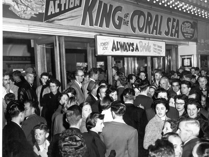 First day audiences attending the screening of King of the Coral Sea crowding the Victory Theatre, Sydney 10 September, 1954.