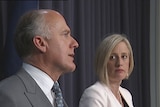 Chief Minister Katy Gallagher watches as Senator Eric Abetz explains the loan deal.