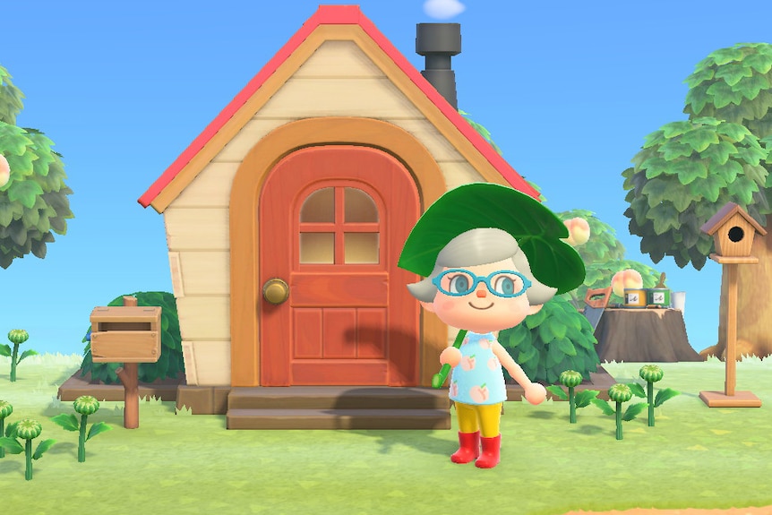 A cartoon-like character in a video game stands outside a little house holding a leaf as an parasol.
