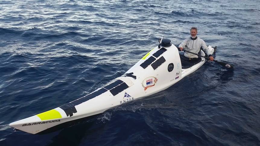 Scott Donaldson paddles his kayak in the Tasman Sea