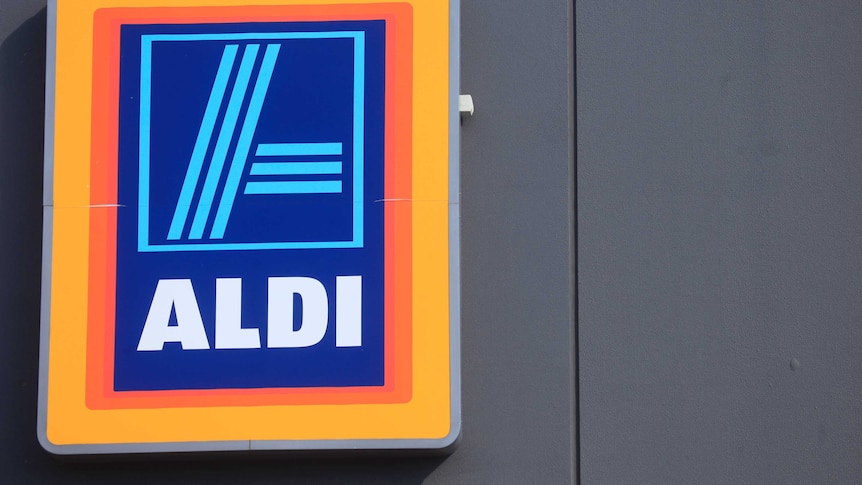 An Aldi logo on the side of a building.