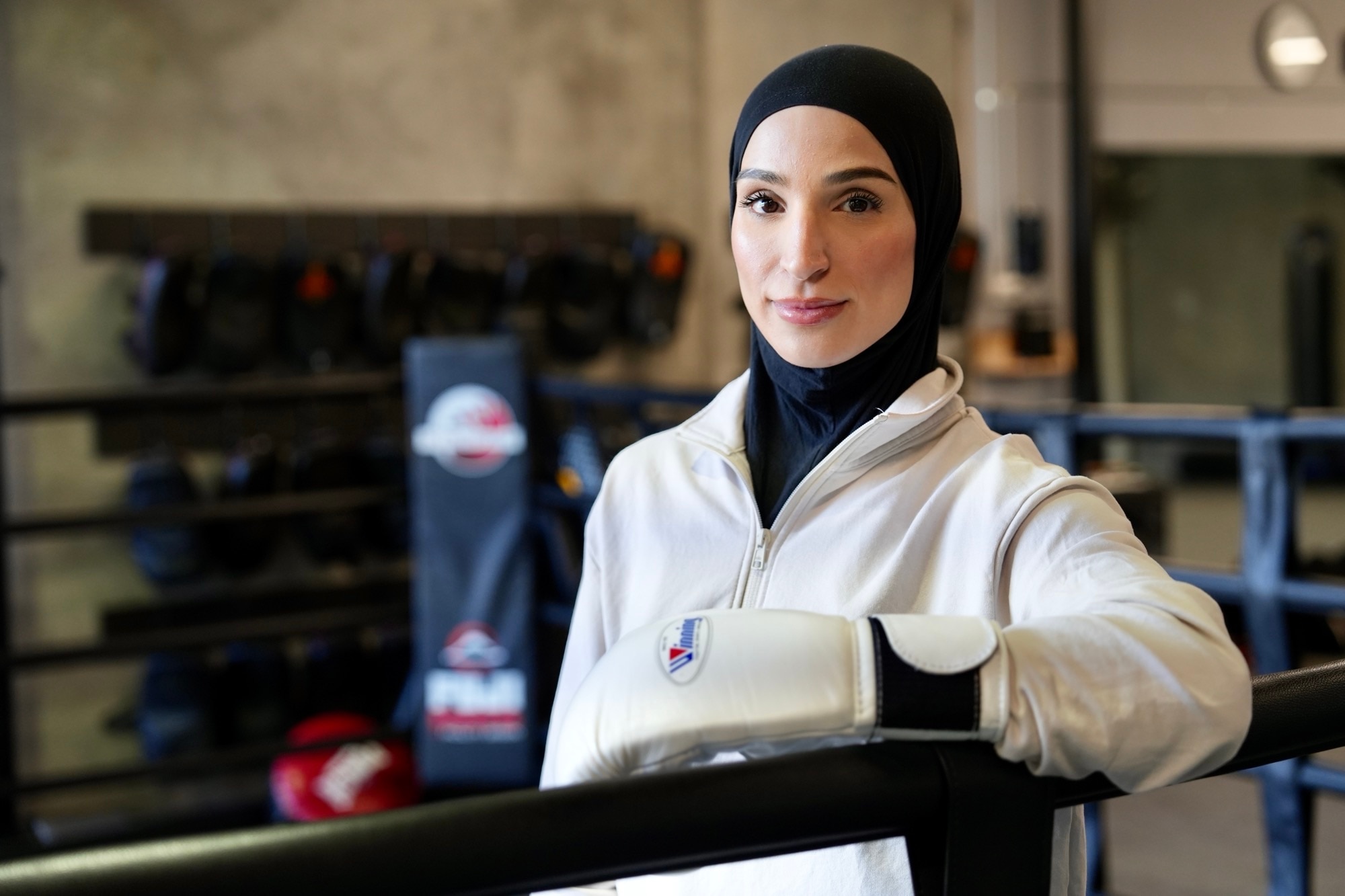 Tina Rahimi posing in a boxing ring.