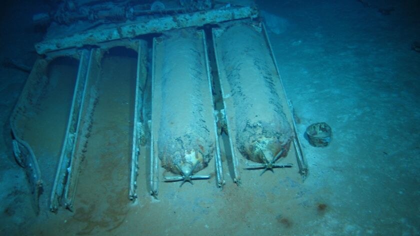 HMAS Sydney quadruple torpedo tube mount on seabed - two weapons loaded.