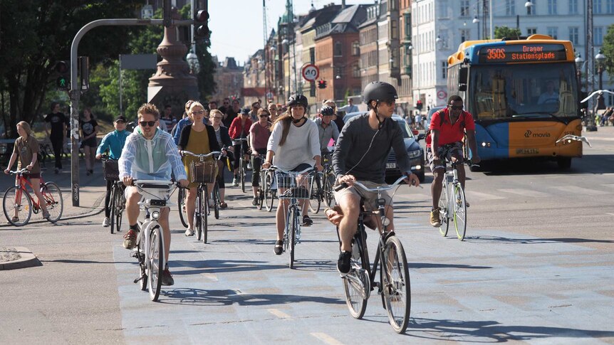 Cyclists riding in Copenhagen, Denmark.