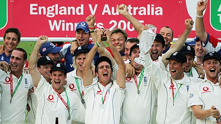 The England team celebrate with the prized urn after winning the Ashes series