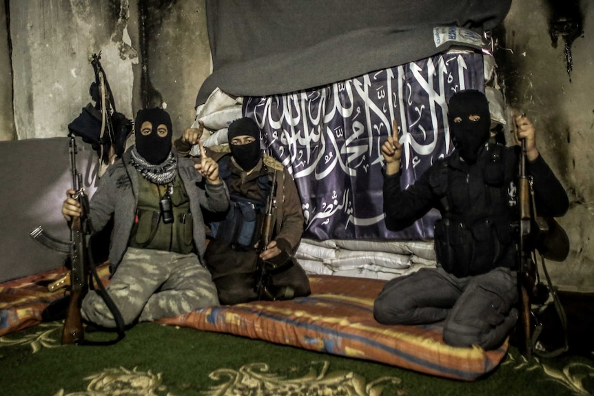 Members of Al Qaeda with covered face from different nationalities in Aleppo.