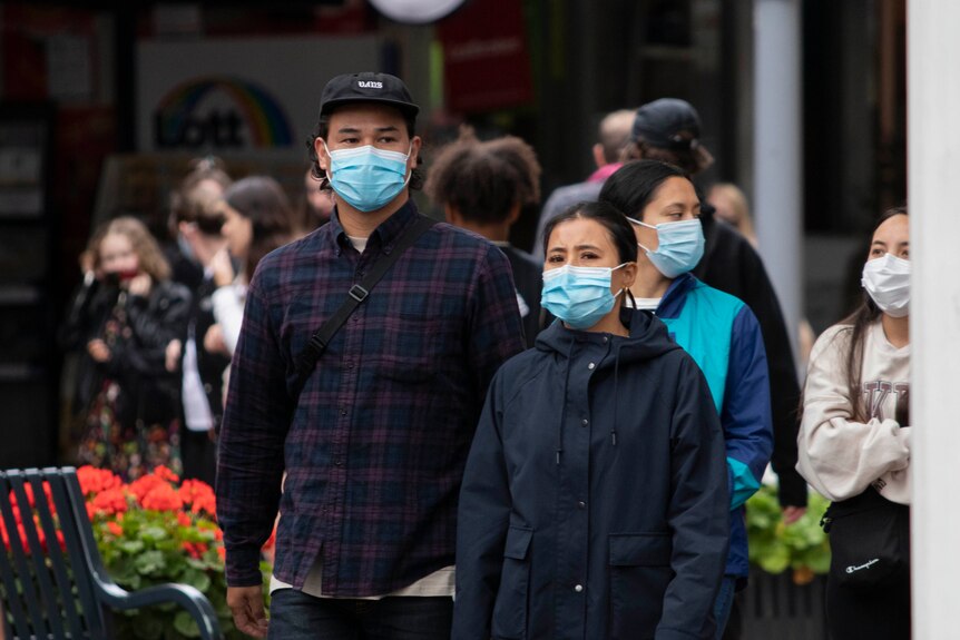 People wearing masks on the streets.