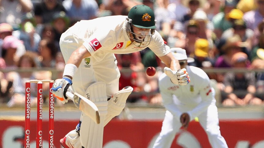 Hussey takes a blow to the body