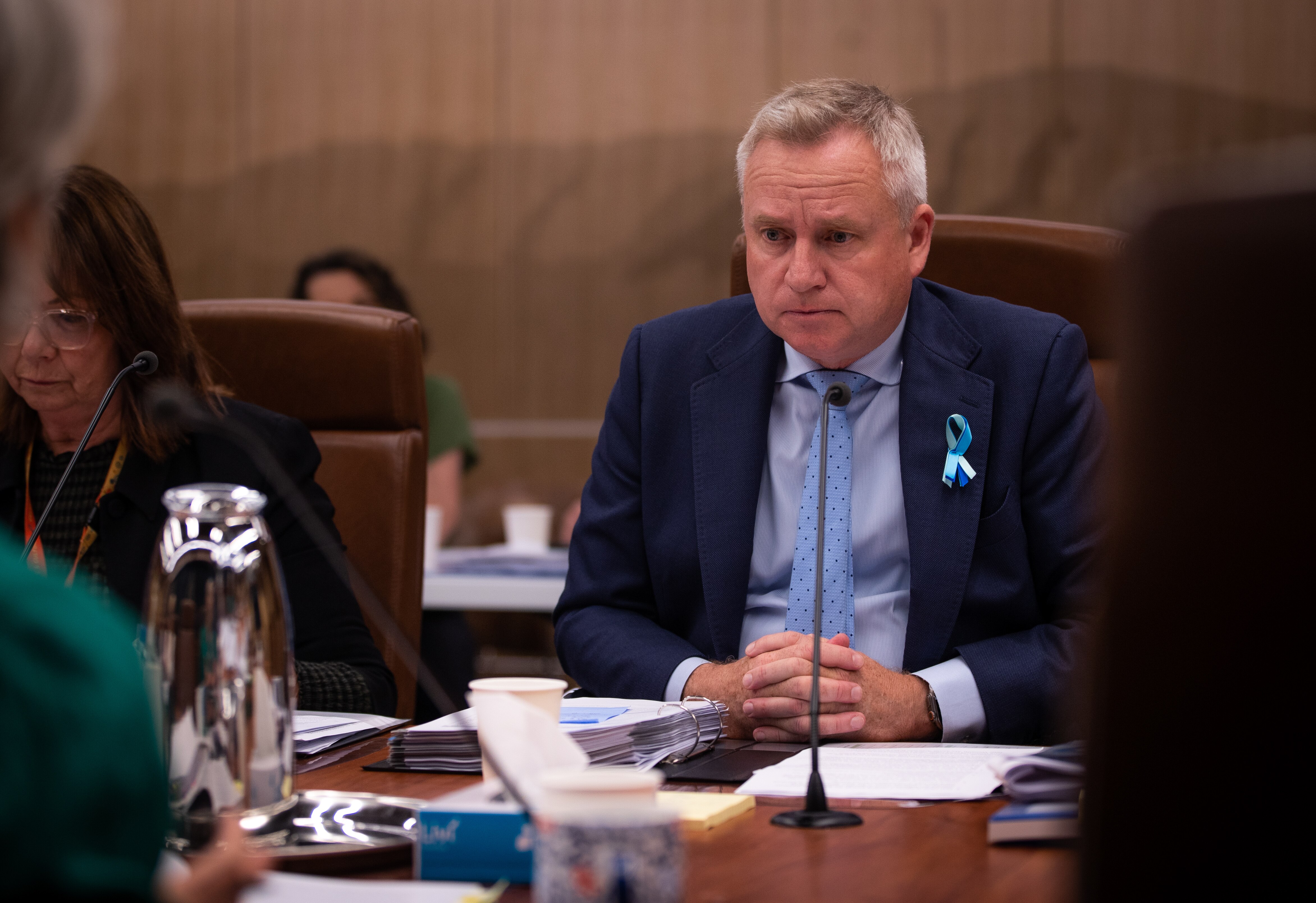 a man in a blue suit.