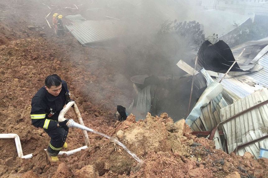 Rescue worker at scene of landslide in southern China