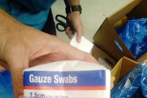 A packet of 100 gauze swabs