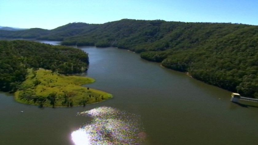 Aerial TV still of full Hinze Dam on Gold Coast hinterland in south-east Qld in October 2008.