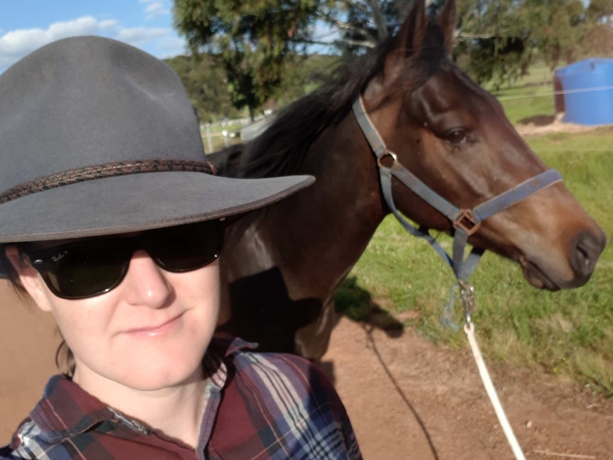 Kerri-Ann Hudson stands with her horse Gunna