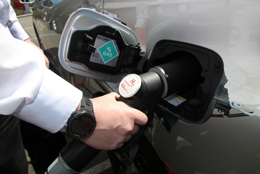 Close-up of the fuel tank of a hydrogen car as it is refuelled.