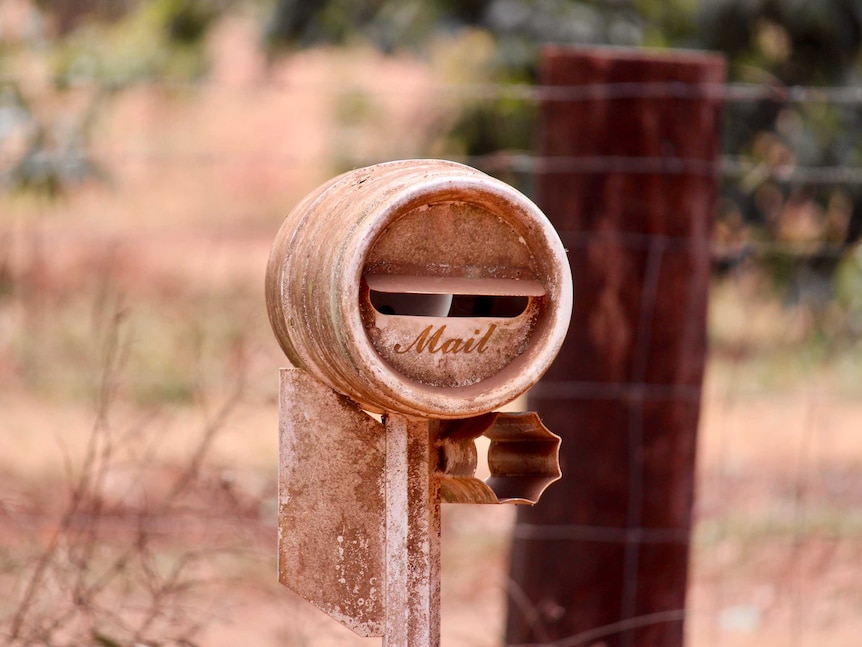 A rural letter box on the side of the road