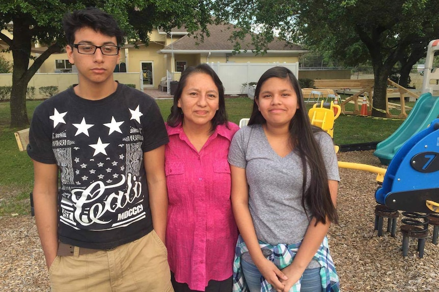 Olivia Flores with her son Joe and daughter Yesenia.