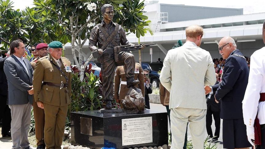 Prince Harry unveils a statue in Fiji.